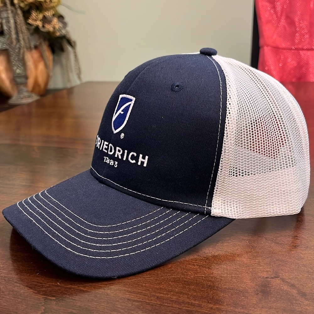 Snap back trucker style hat